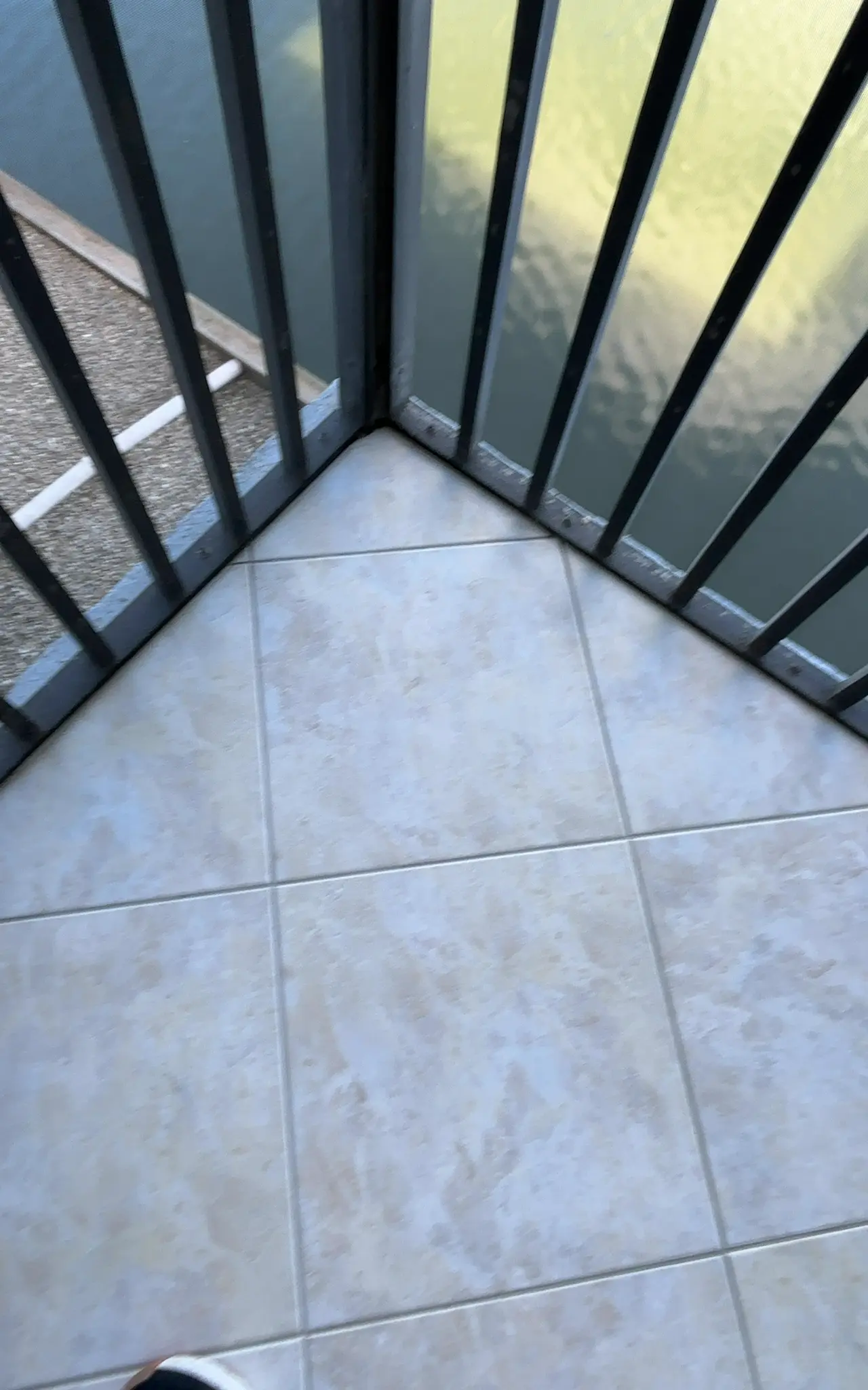 Balcony tile after professional deep clean and clear seal
